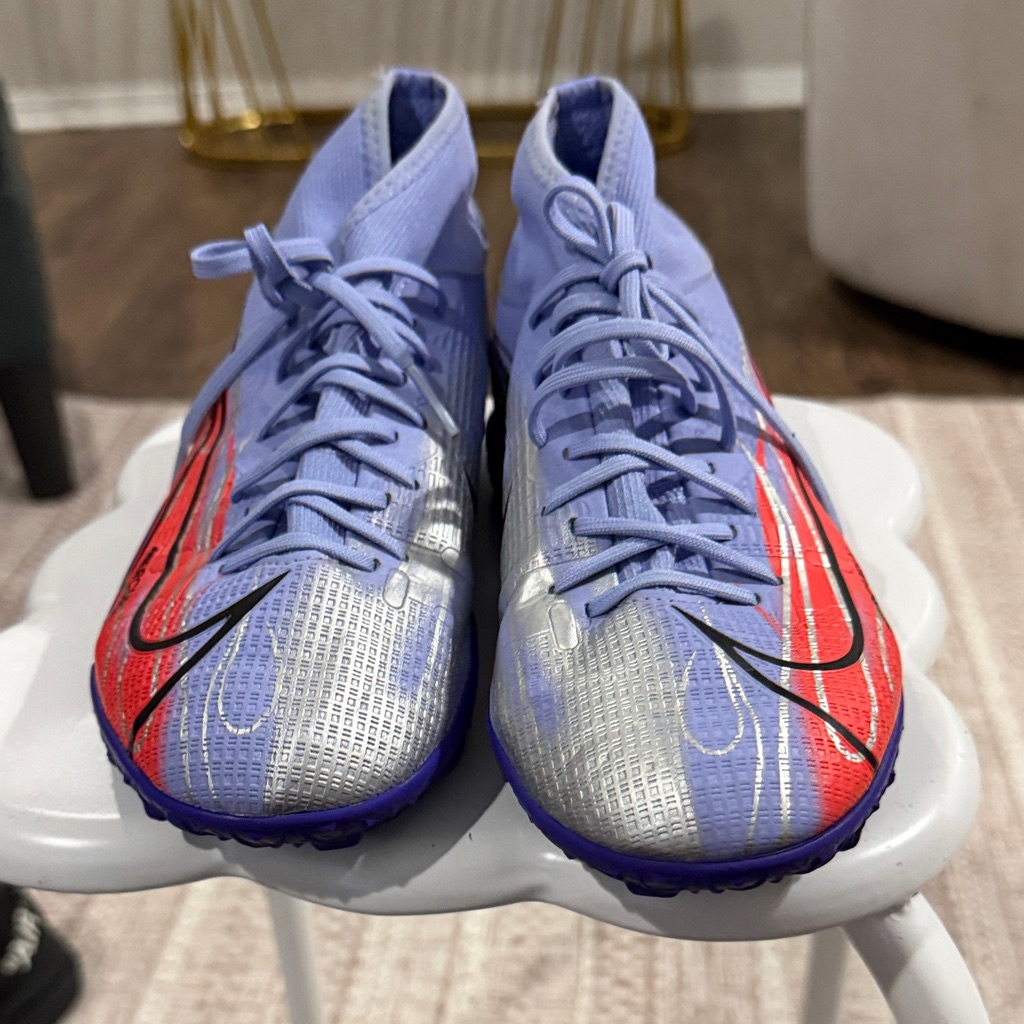 Blue And Silver Athletic Shoes With Red Accents